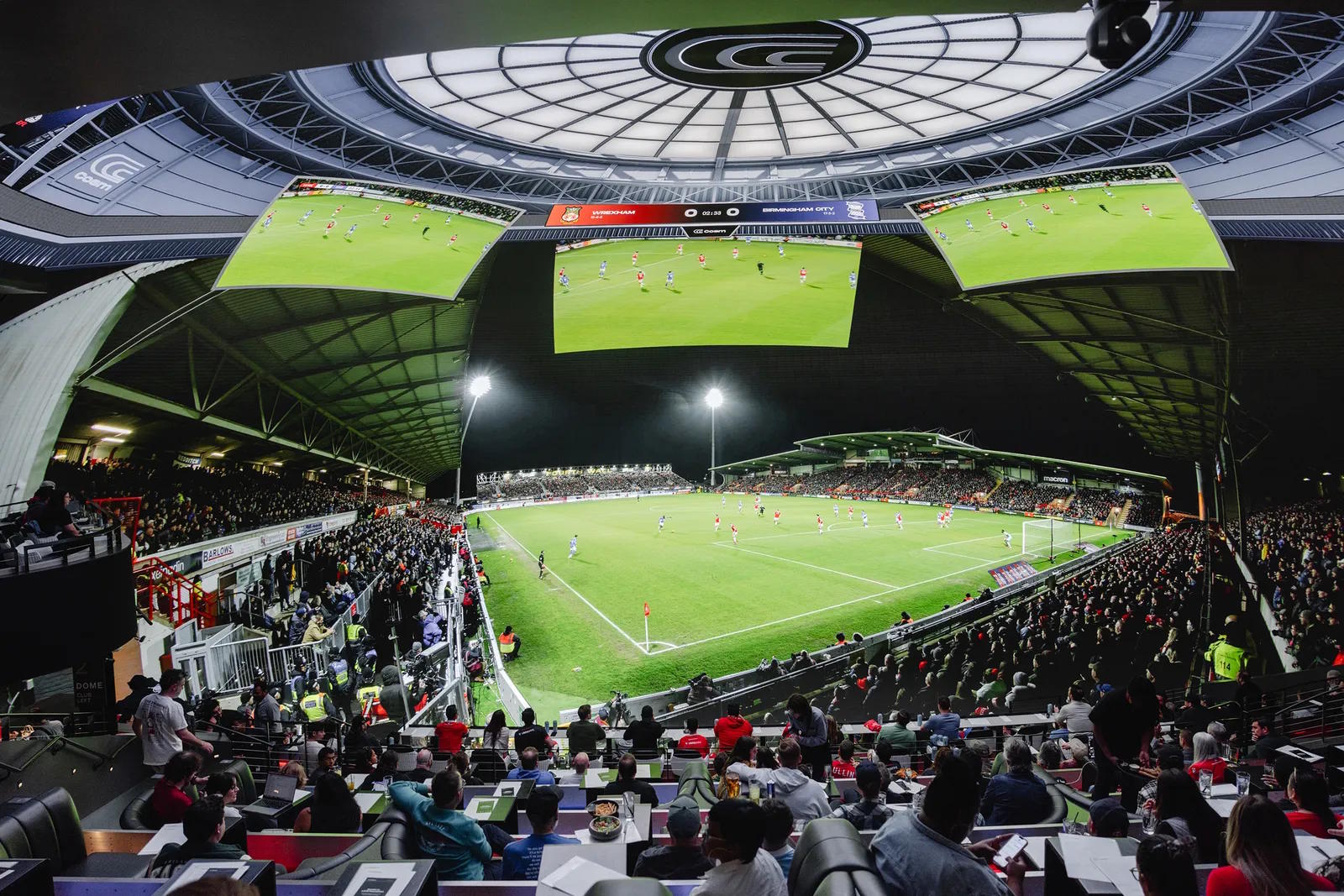 Full stadium view with fans, luxury feel